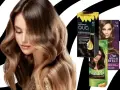 Kobieta z pięknymi, falowanymi włosami brązowymi, obok opakowania farb do włosów Garnier Olia, Joanna i Wella.